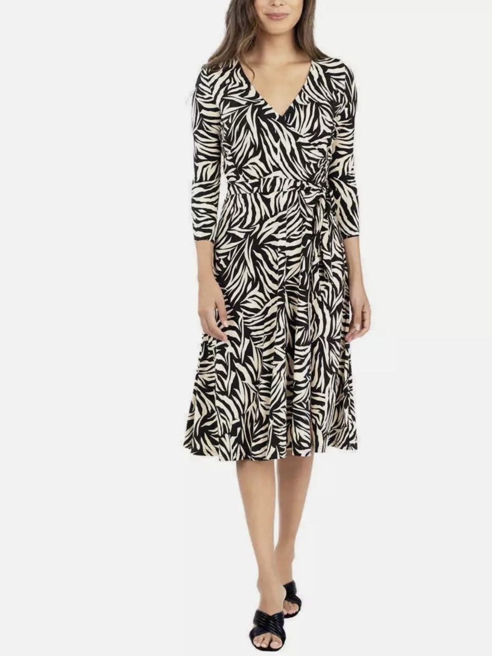 Leota black and white wrap dress with pockets. Size M